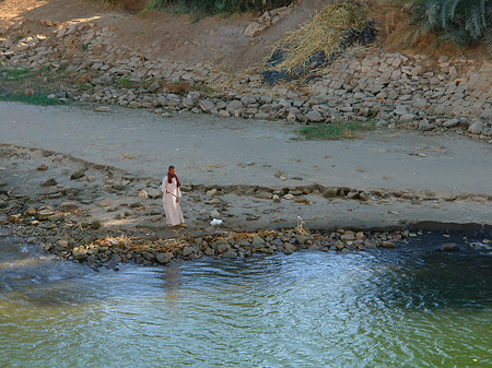Mann am Wasser Fotos
